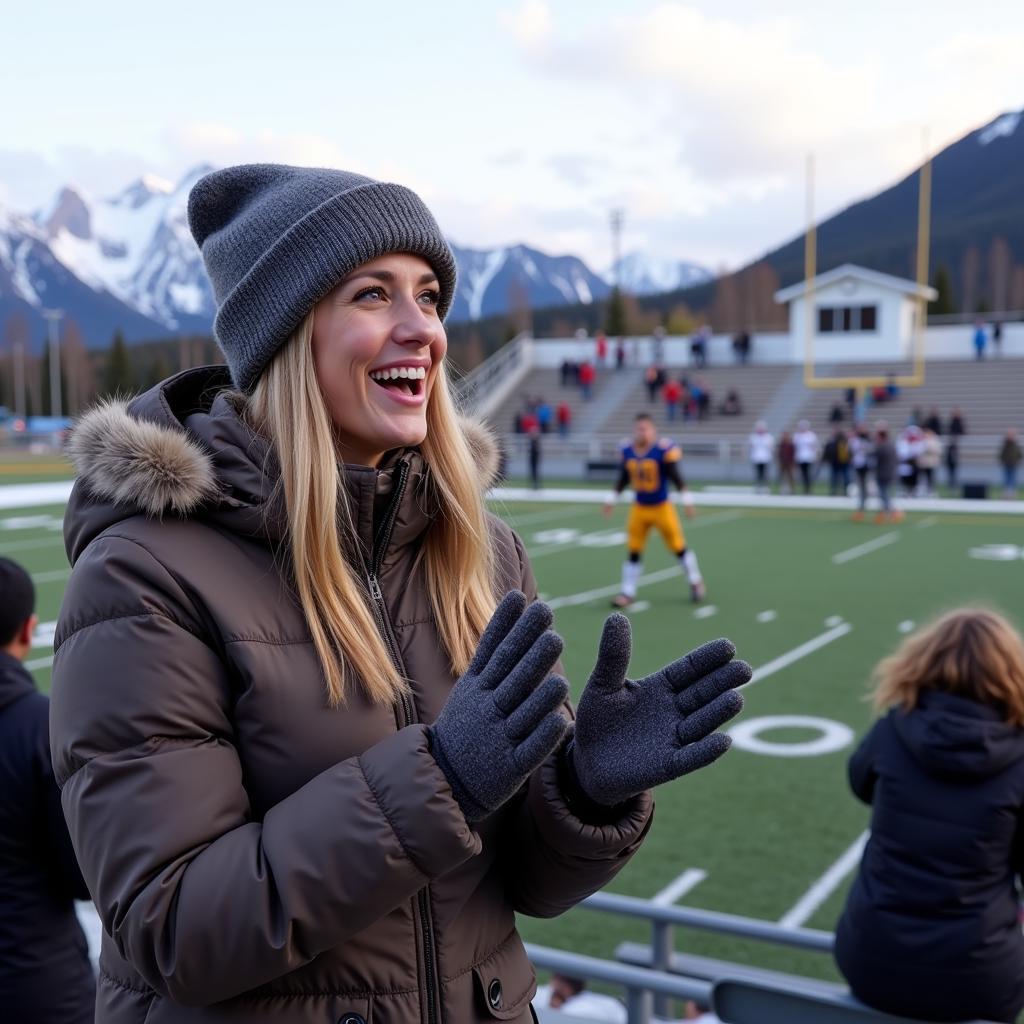 Actress Cheering for Her Football Player Husband at a Game in Alaska