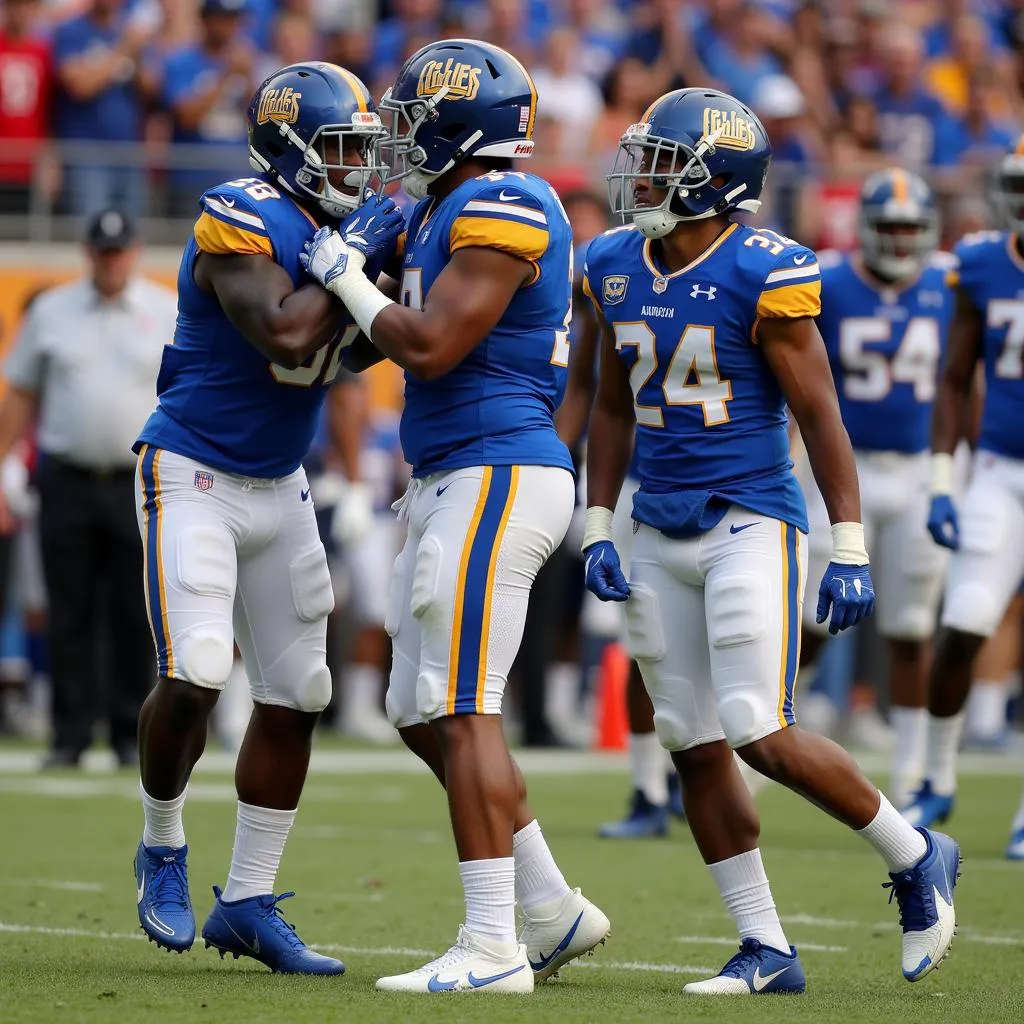 Akron Zips Football Players Celebrating a Score