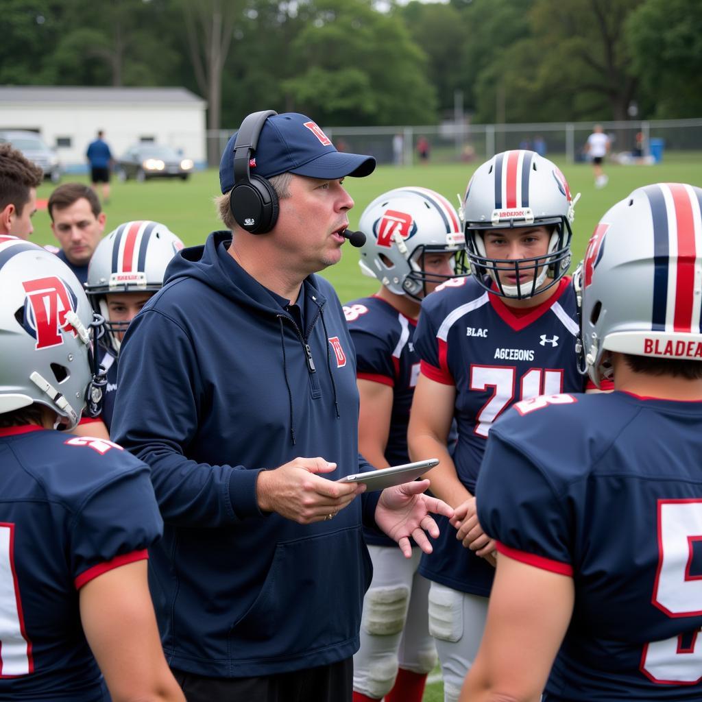 Blackman High School football players huddling before a play.