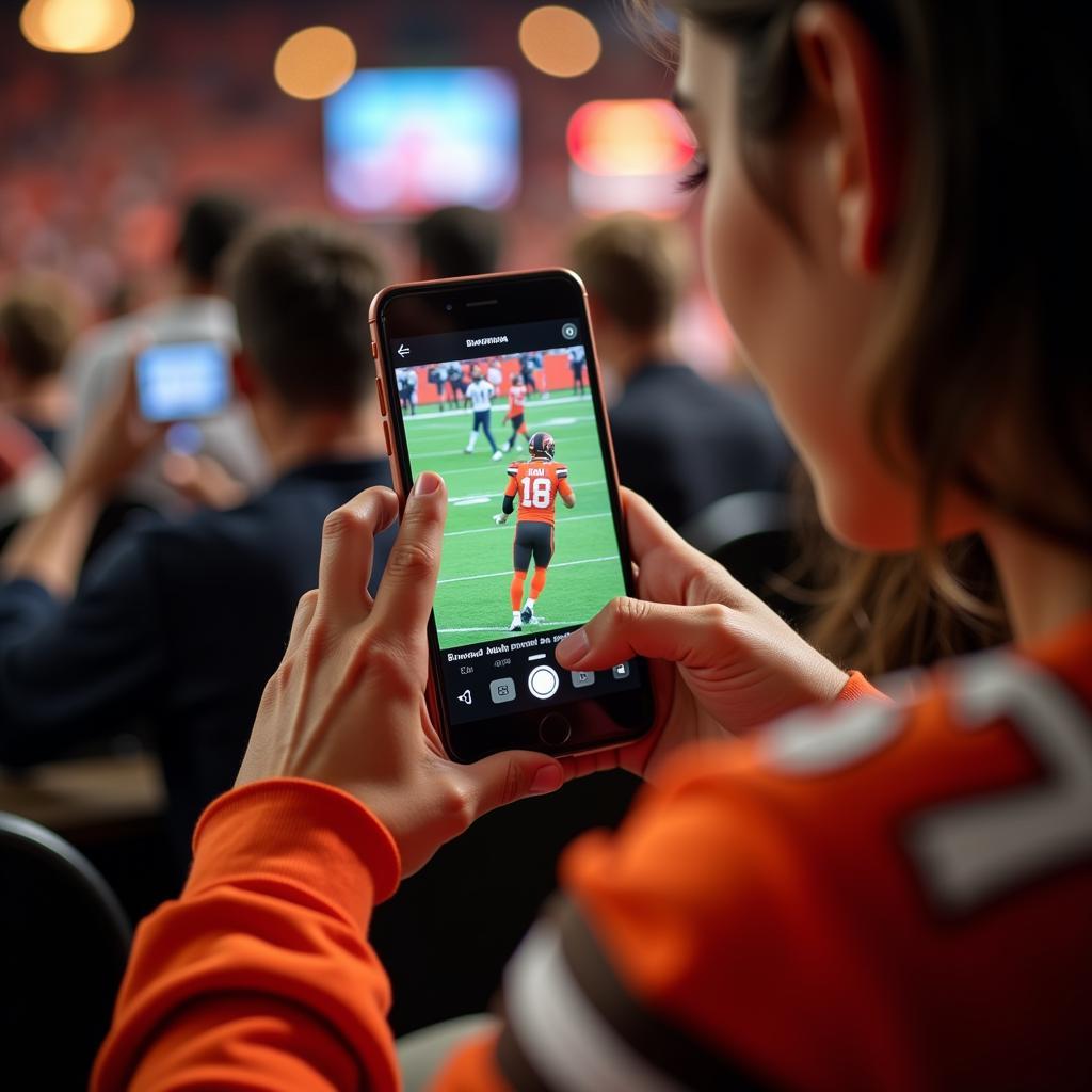 Browns Fan Enjoying Live Stream on Phone