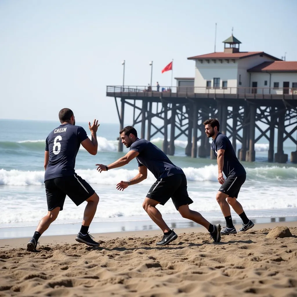 Football players training on the beach in Santa Cruz