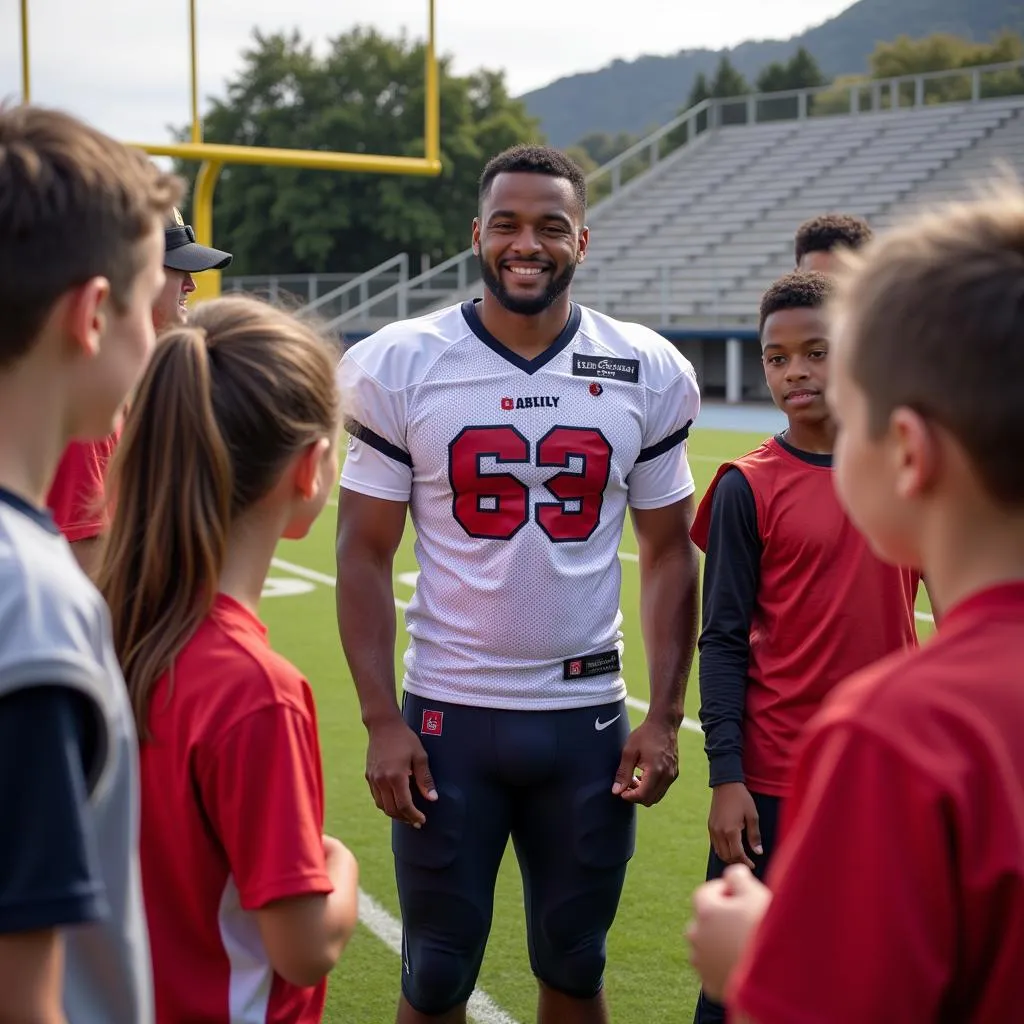 Football player mentoring young athletes in Santa Cruz