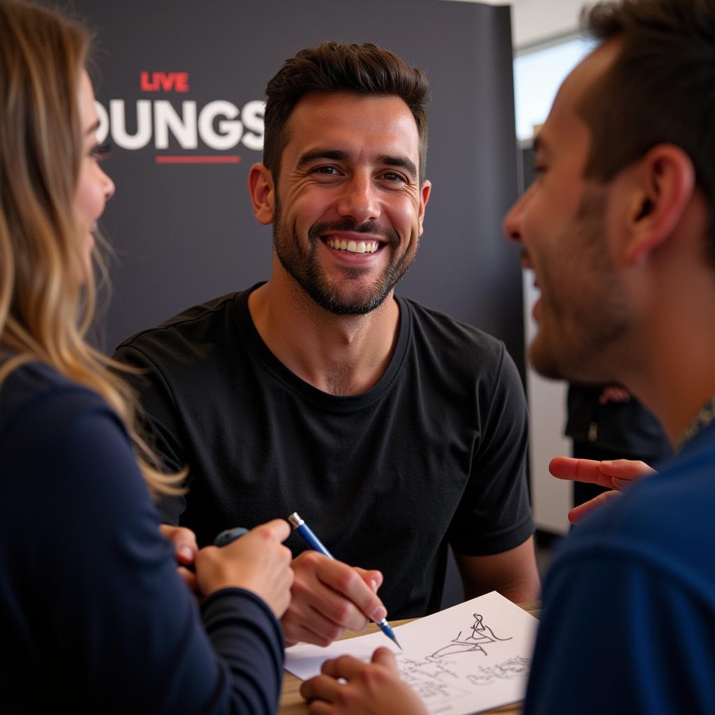 Footballer signing autographs at Football Weekly Live London 2018