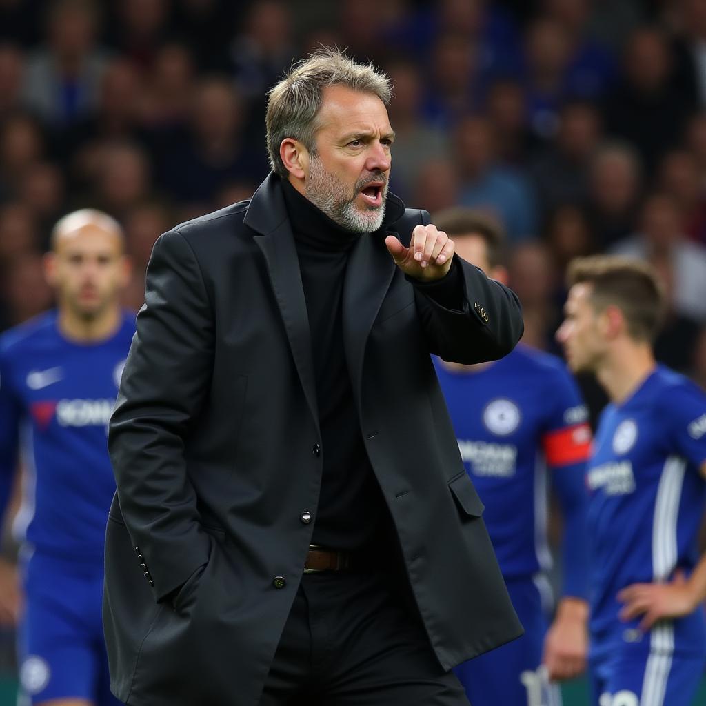 Chelsea manager giving instructions on the sidelines