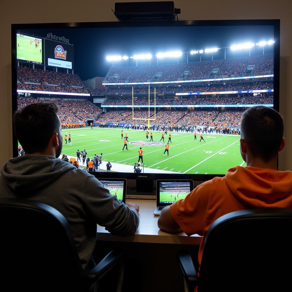 Commerce Tigers football team in action during a live streamed game