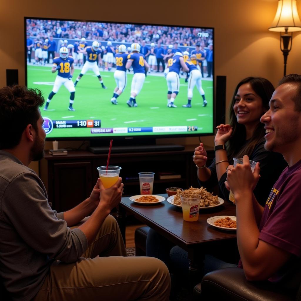 Friends gathered to watch a live stream of East Ascension High School football game