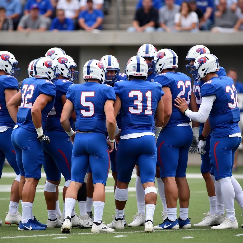 Grand Valley State Football Players in a Huddle