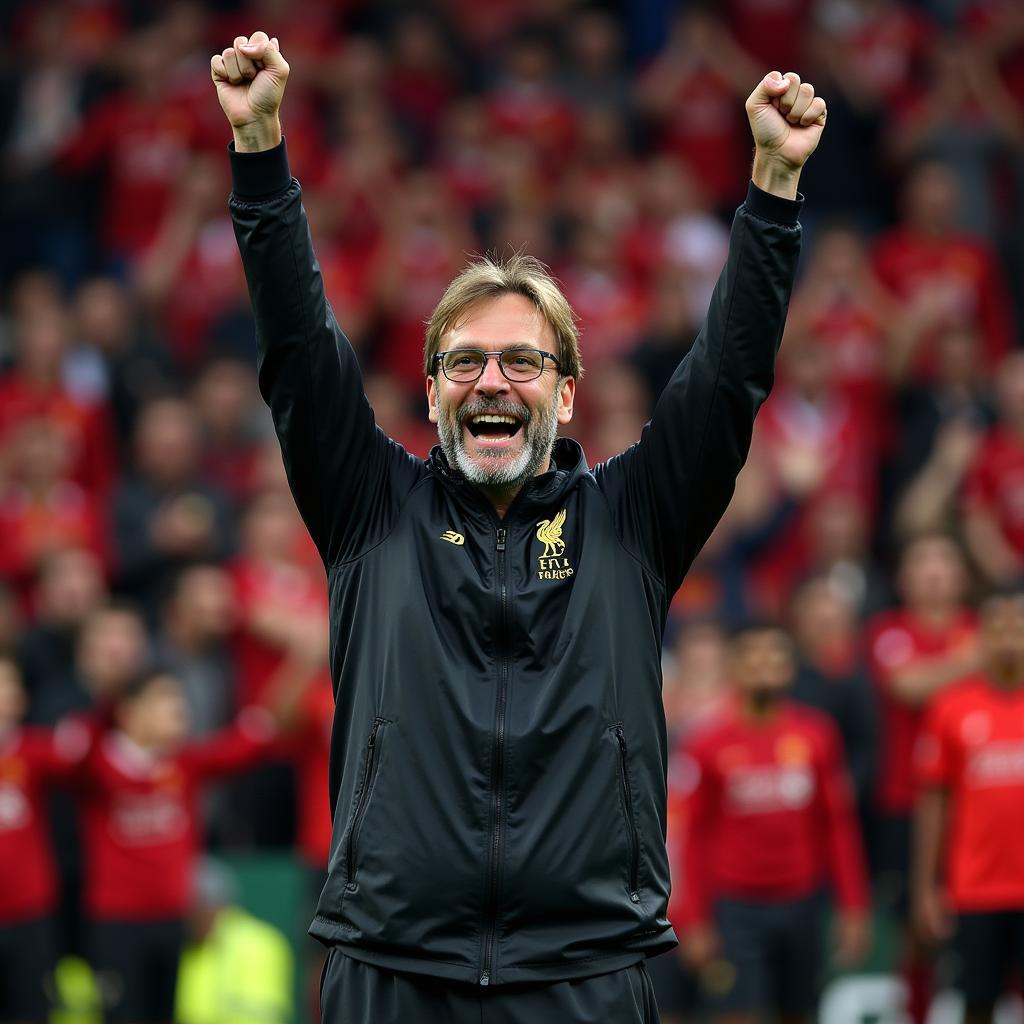 Jürgen Klopp celebrates receiving the Best FIFA Men's Coach award