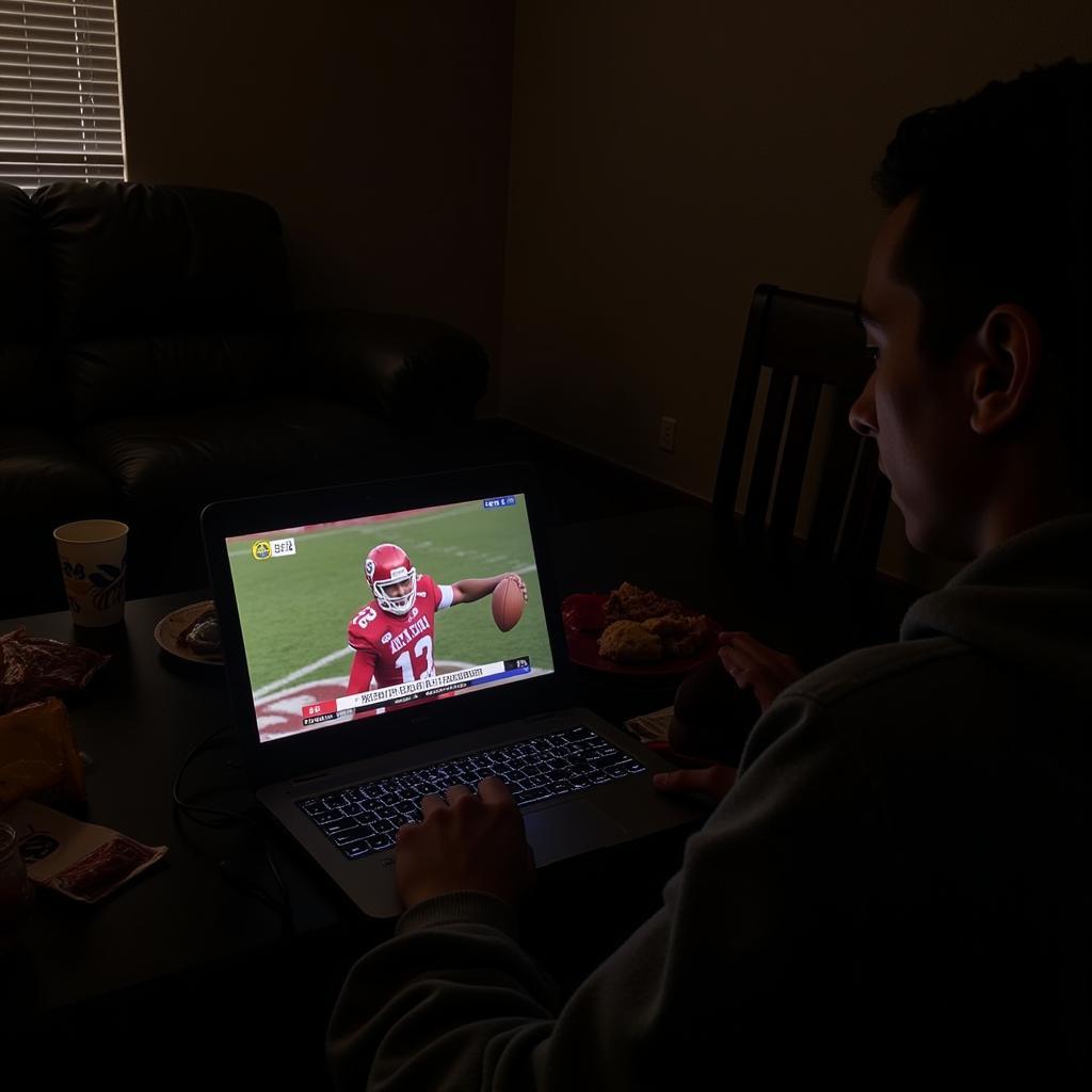 Watching the Arkansas vs. Missouri Game on Laptop