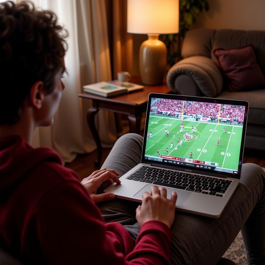 Streaming Oklahoma Football on Laptop