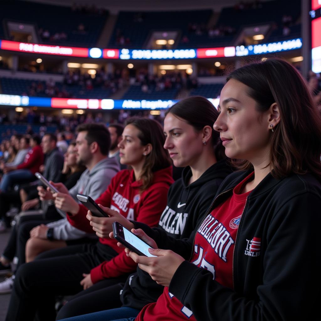 Fans checking Allen Eagles football live scores on their phones during a game.