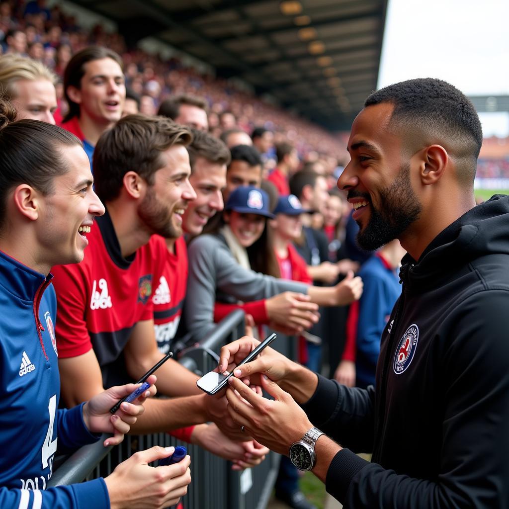 Asher Jordan interacting with fans after a Liv Football match