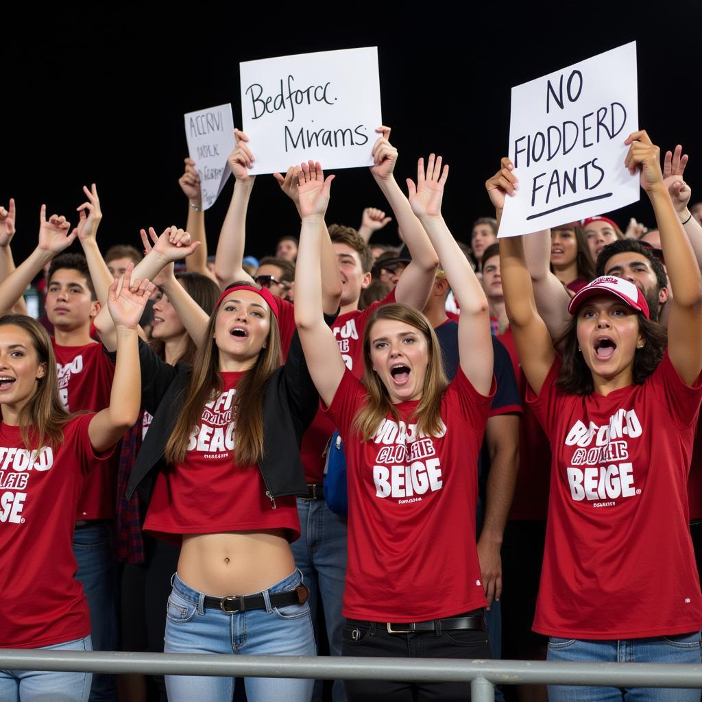 Bedford football fans cheering in the stands.