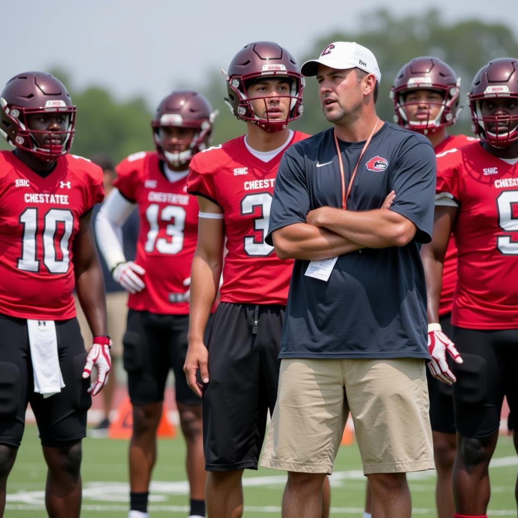 Chestatee Football Coach Discussing Strategy with Players