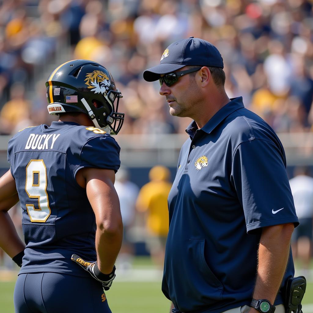 Commerce Tigers football coach discussing strategy