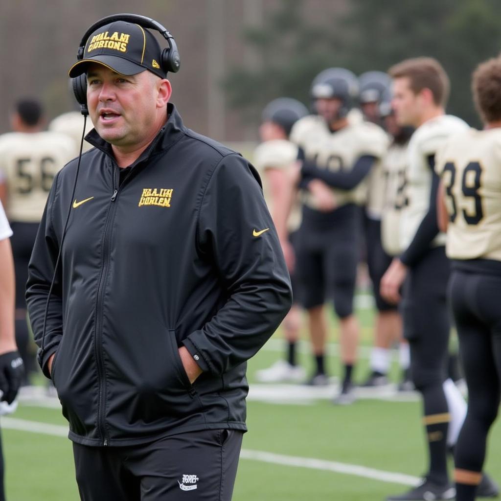 Corunna High School Football Coach Giving Instructions