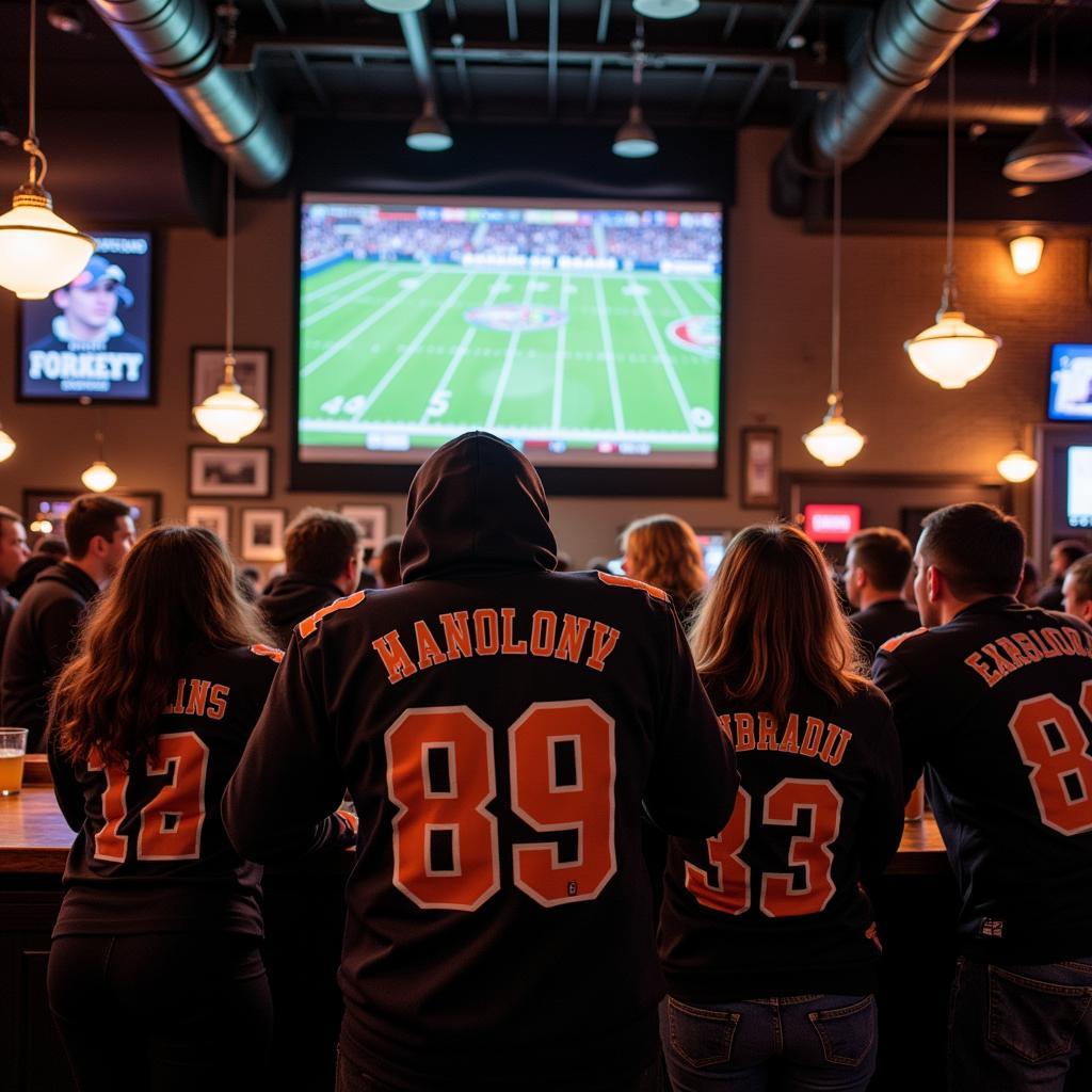 Friends Watching Cuyahoga Falls Football Live Stream at a Bar