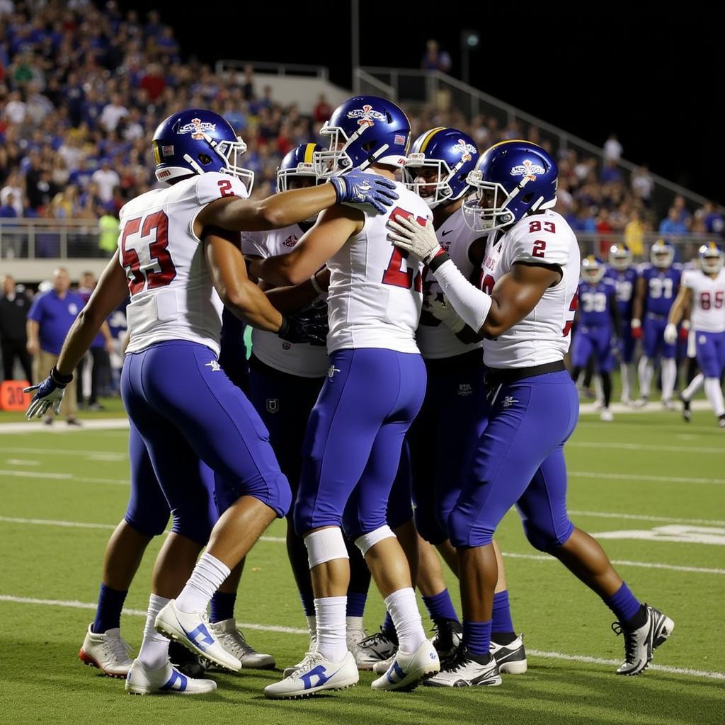 Klein Cain Hurricanes football team celebrating a victory.