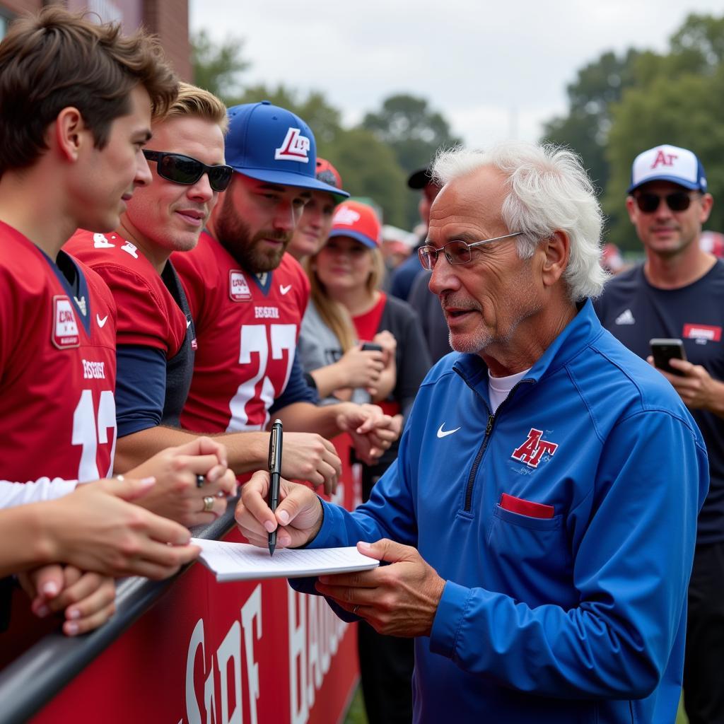 Lee Corso interacting with fans before a college game