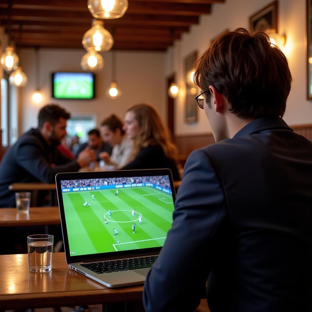 Watching a France football live stream on a laptop