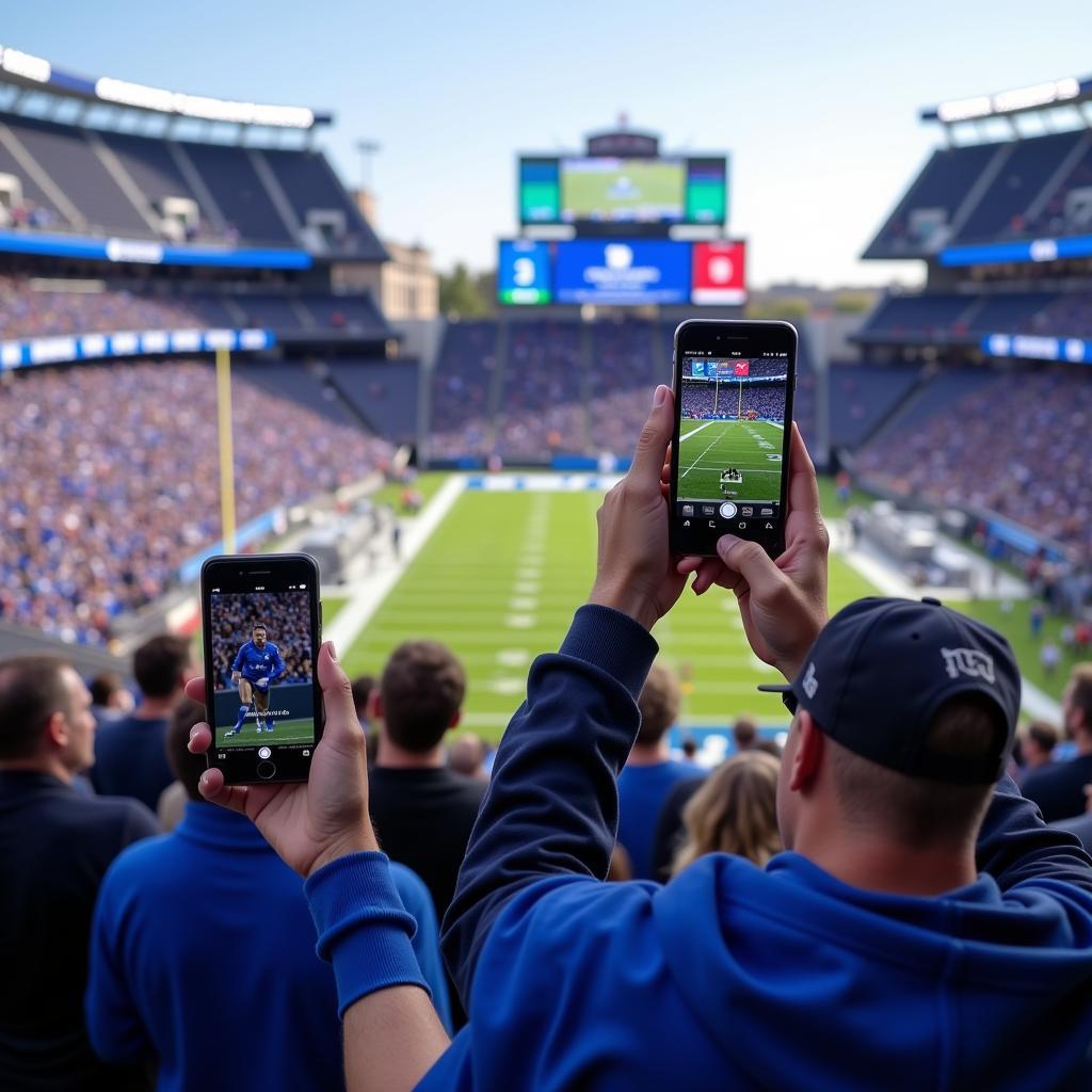 Duke Football fans checking live scores during the game