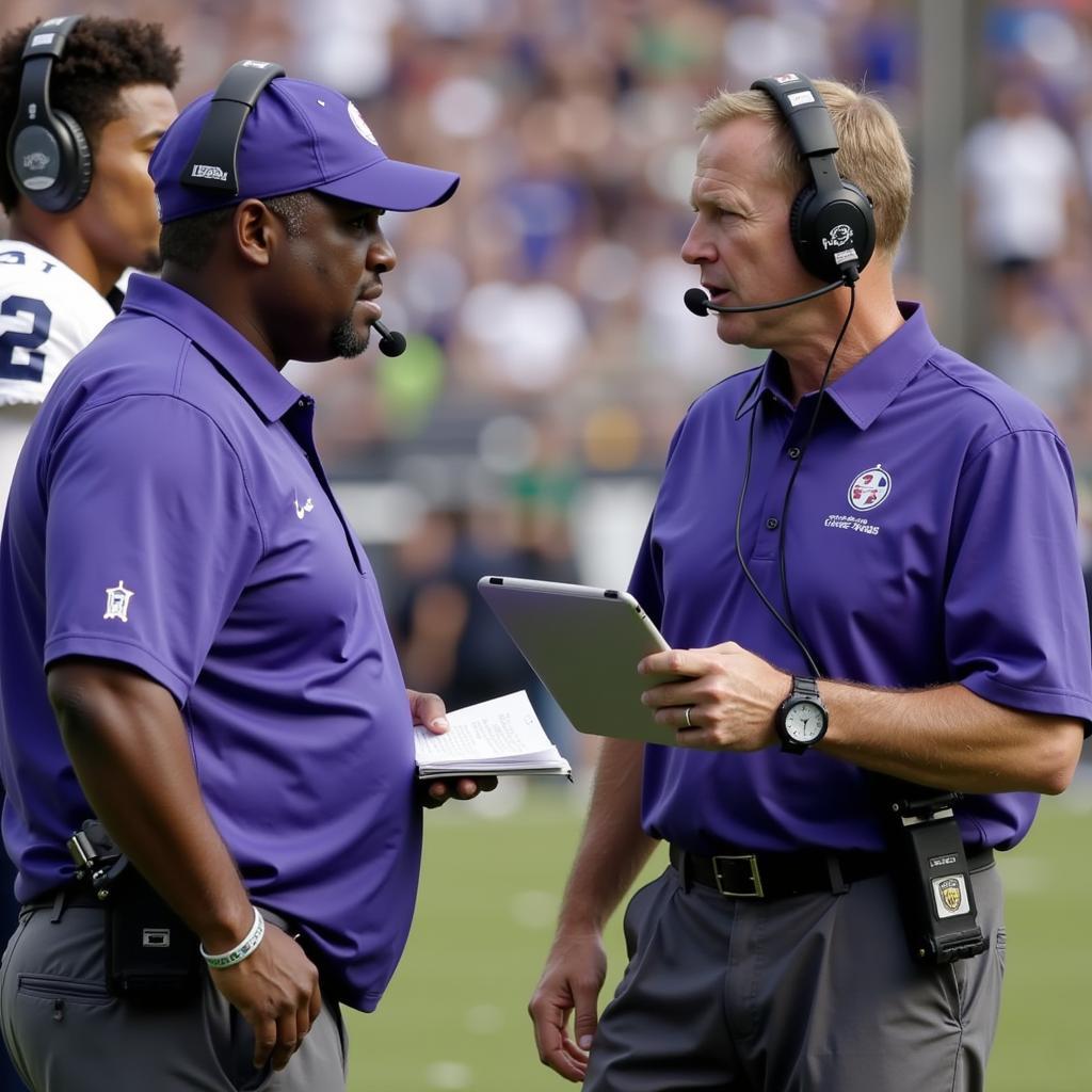 Coaches analyzing player performance and tactical adjustments during a preseason football game.